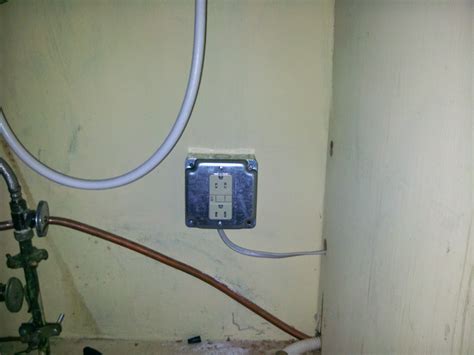 electrical box under kitchen sink|putting electrical outlet under sink.